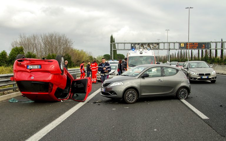 Overturned vehicle roadside for an accident recovery call