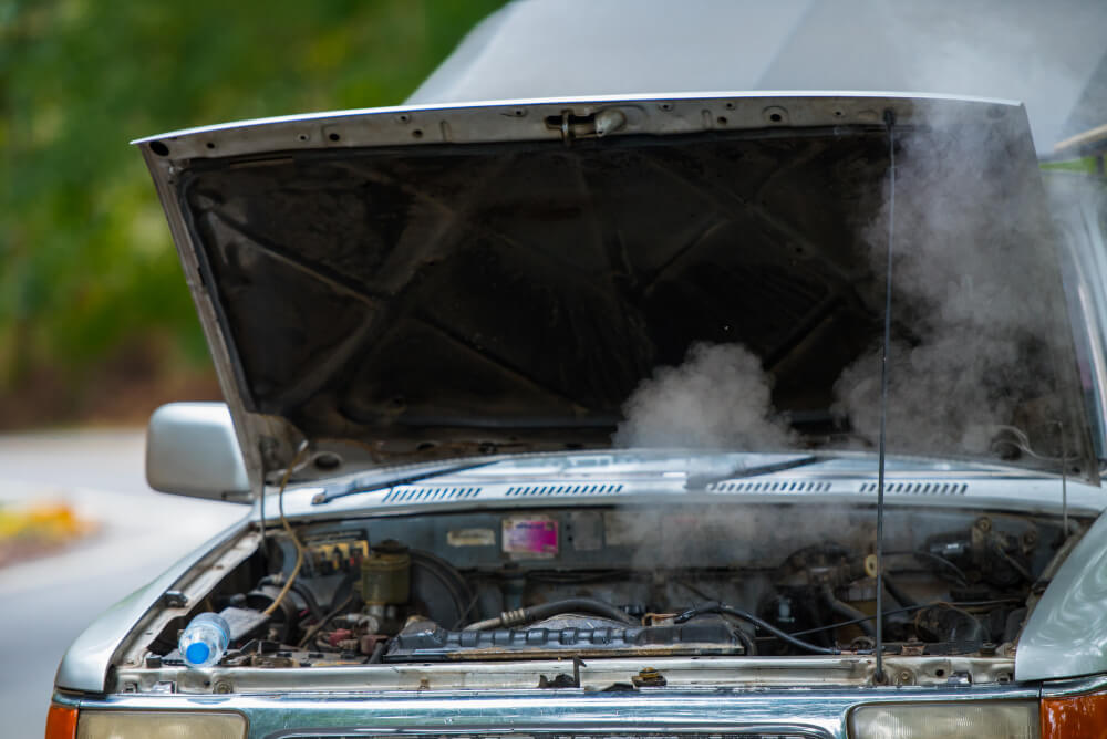 You are currently viewing Car Overheating While Driving: Causes and What to Do Next